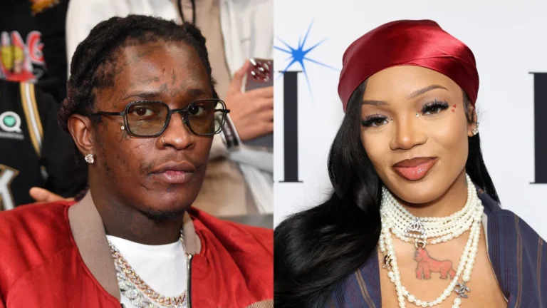 Young Thug wearing glasses, diamond earrings, and a red jacket sitting courtside, alongside GloRilla in a red satin headscarf, layered pearl necklaces, and bold makeup at a red carpet event.