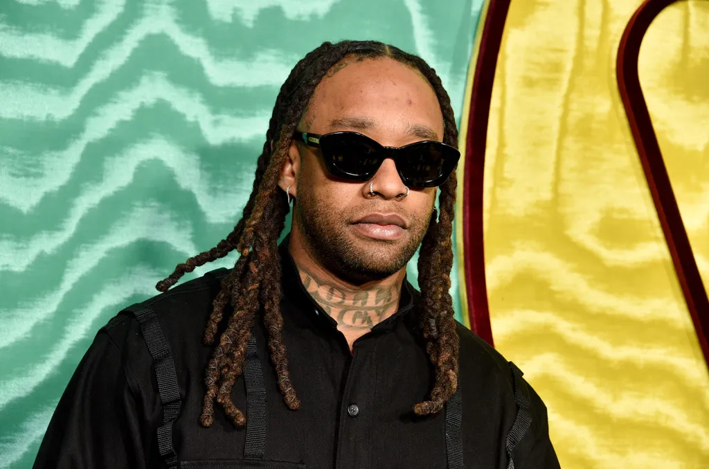 Ty Dolla Sign wearing sunglasses and black attire at a 2024 Warner Music Group event