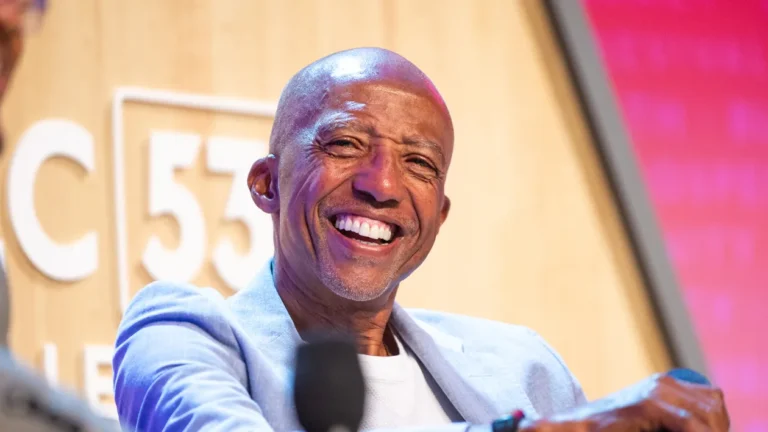 man smiling on stage