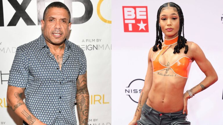 two artists standing side by side