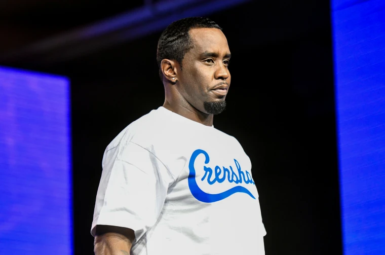 artist smiling into crowd