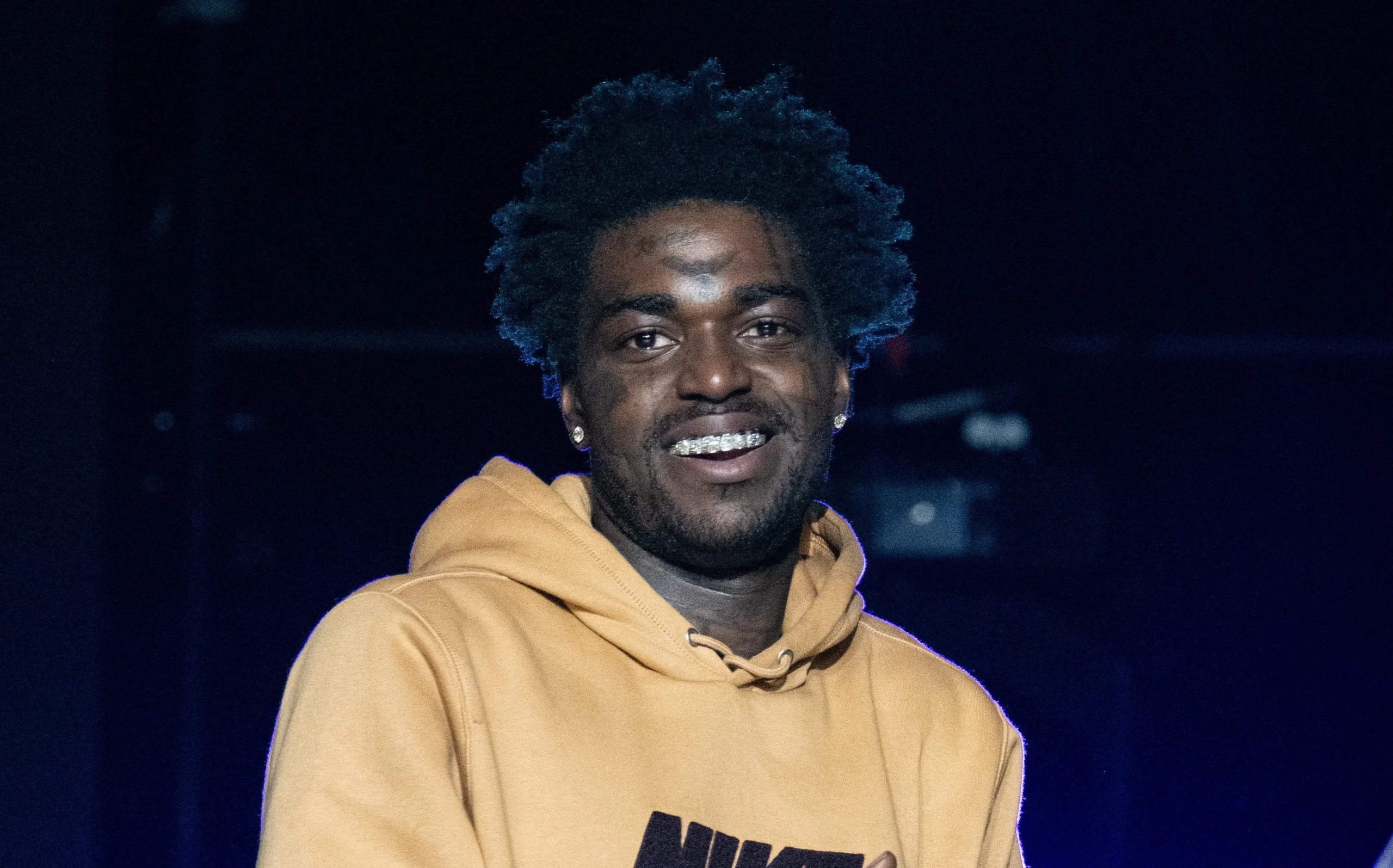 artist posing on stage