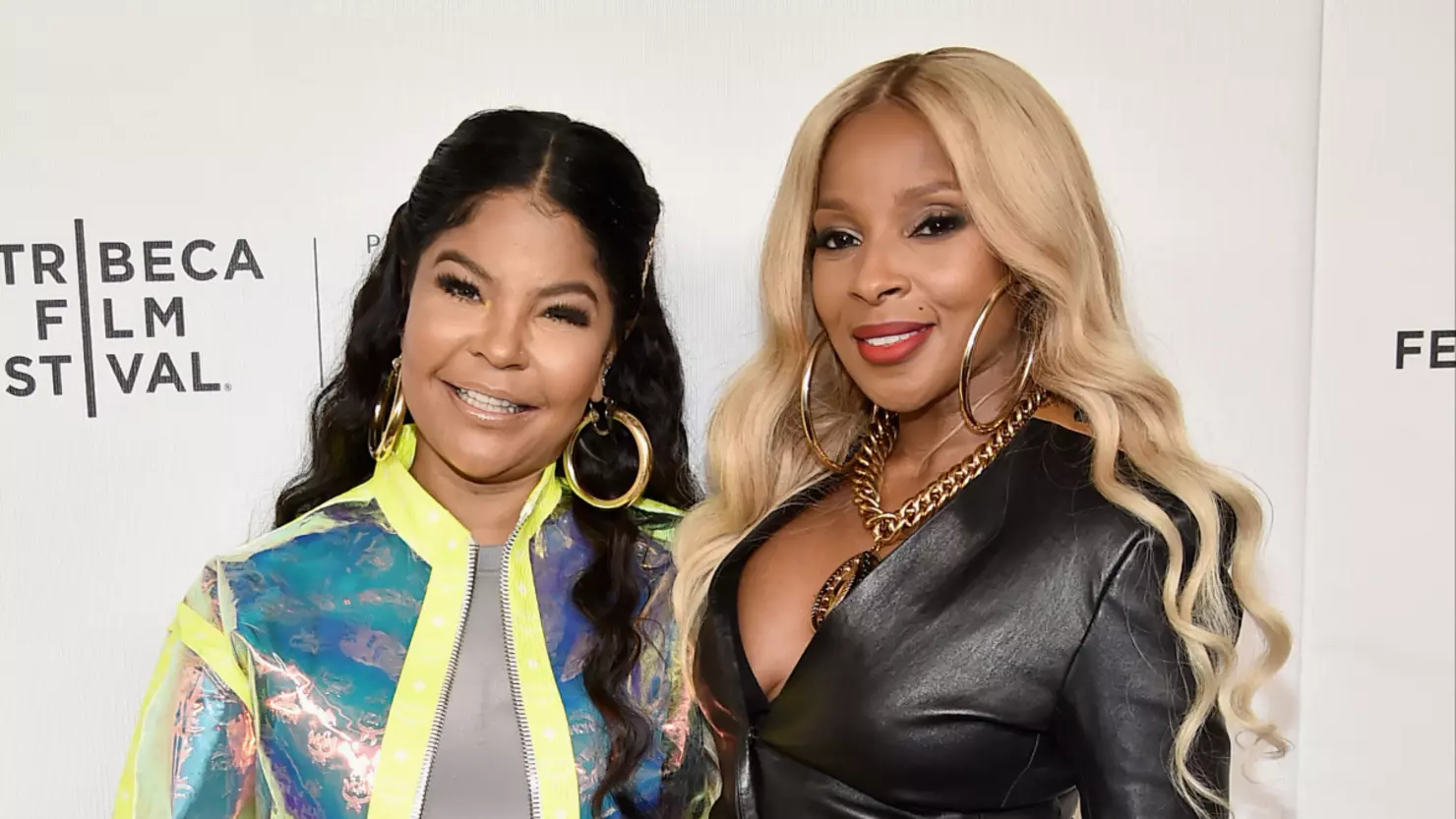 two women standing side by side