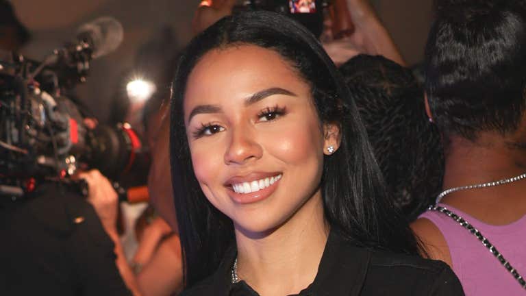 woman smiling on stage